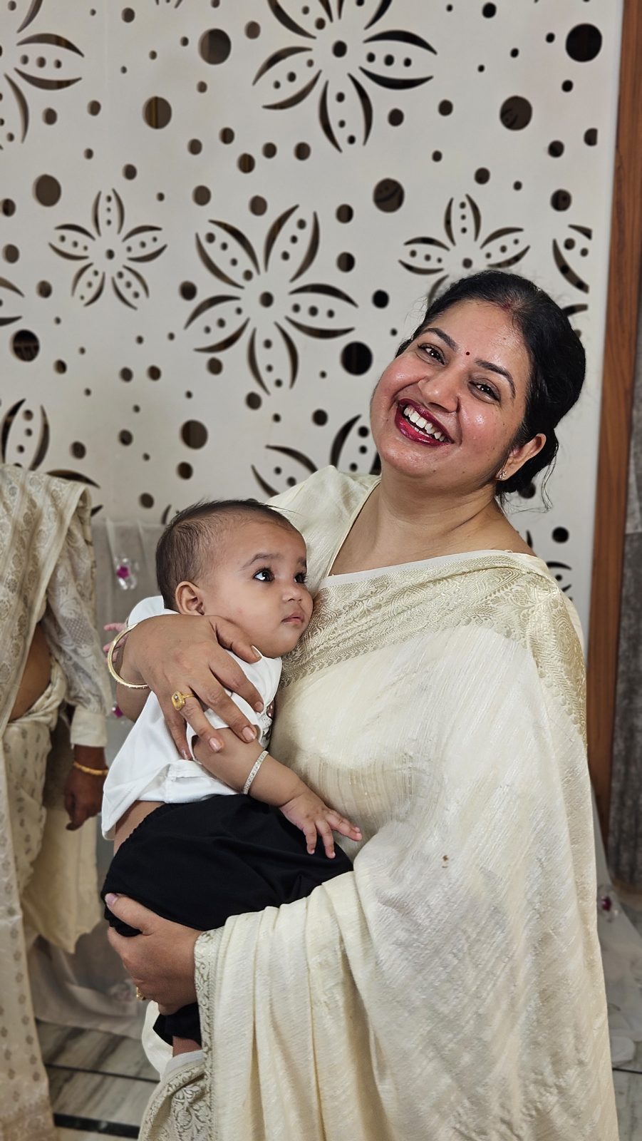 Dr. Shafali Dadhich Tungaria holding a baby